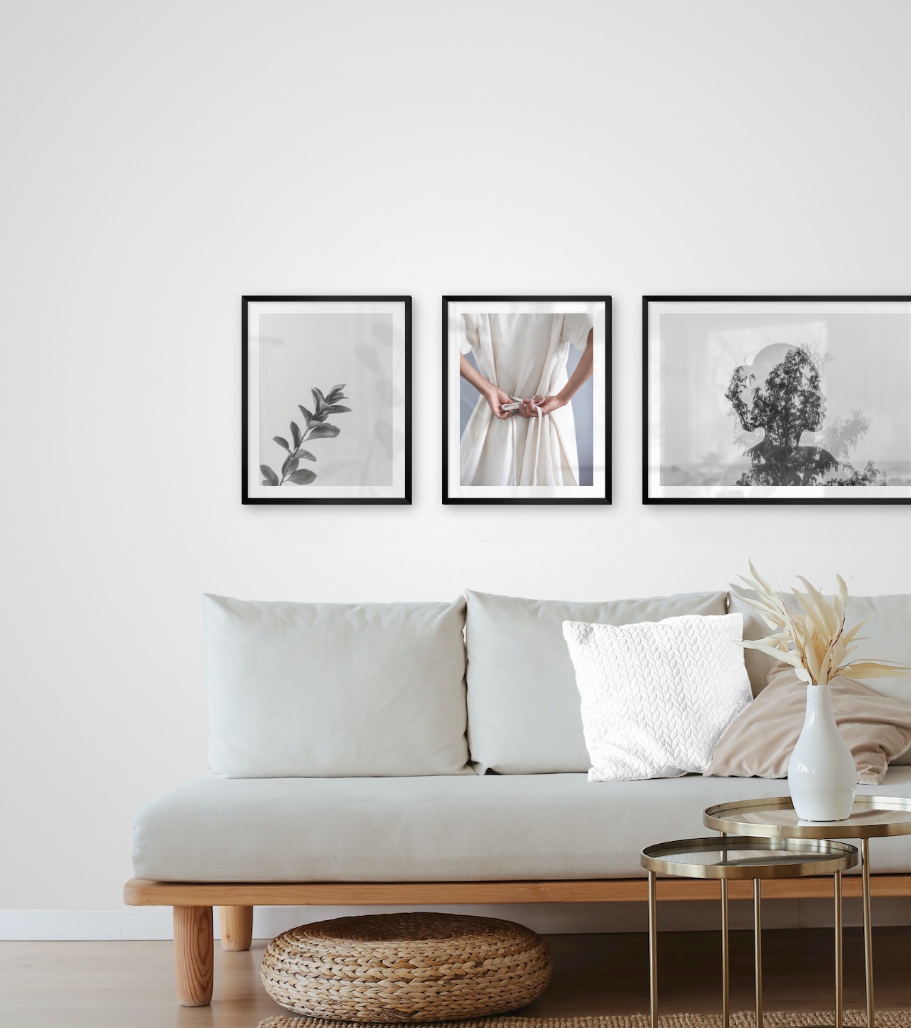 Tavelvägg med ramar i svart i storlekar 40x50 och 50x70 med posters med "Kvist", "Klänning med midjeband" och "Träd och silhuett"
