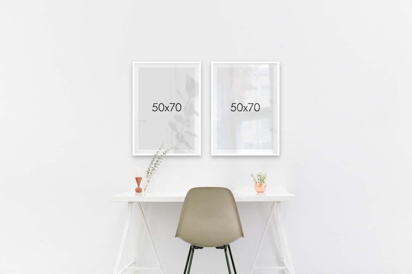 Tavelvägg med ramar i vitt i storlekar 50x70