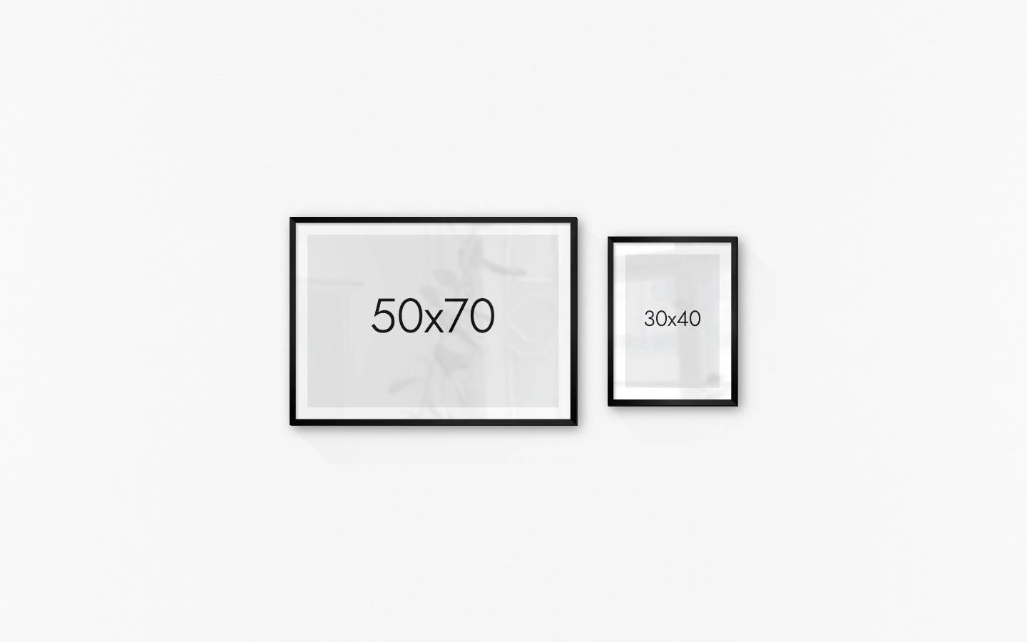 Tavelvägg med ramar i svart i storlekar 50x70 och 30x40
