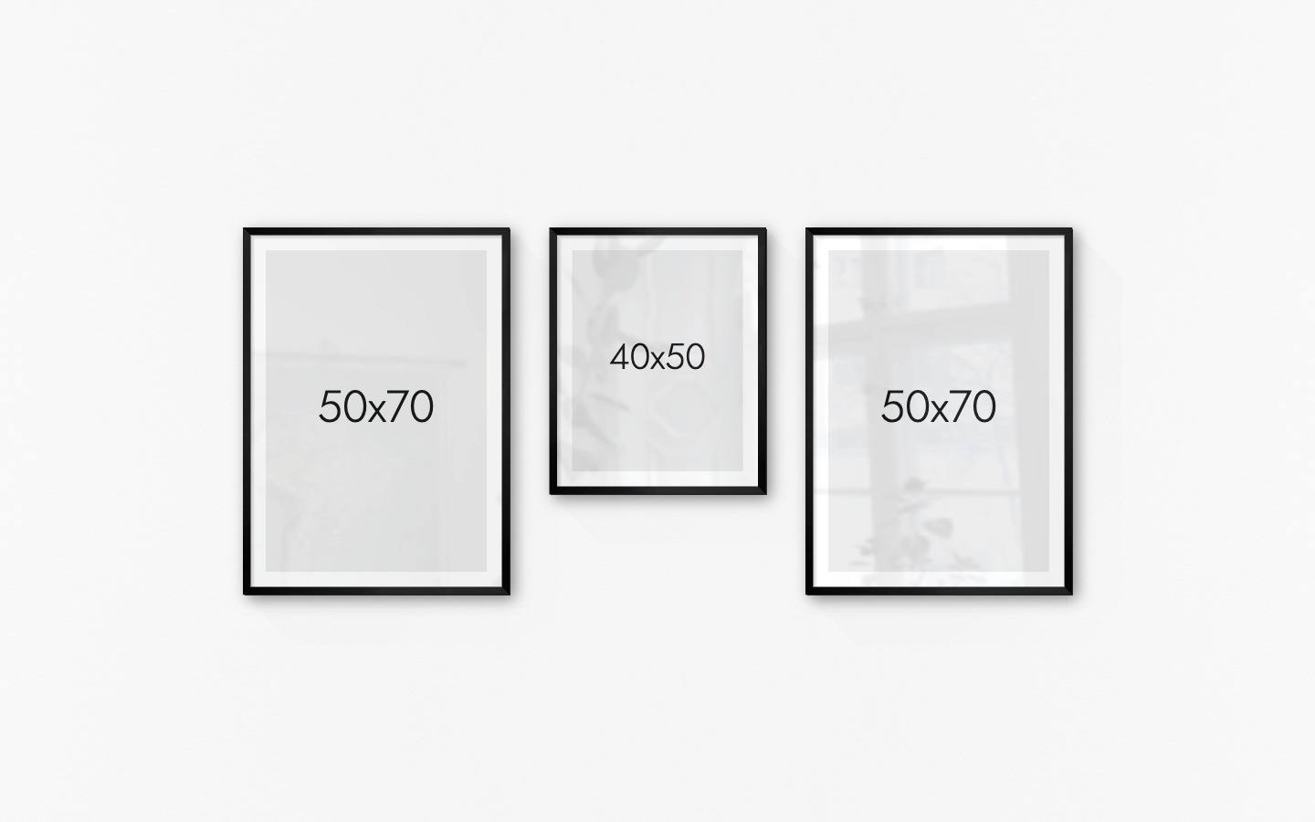 Tavelvägg med ramar i svart i storlekar 50x70 och 40x50