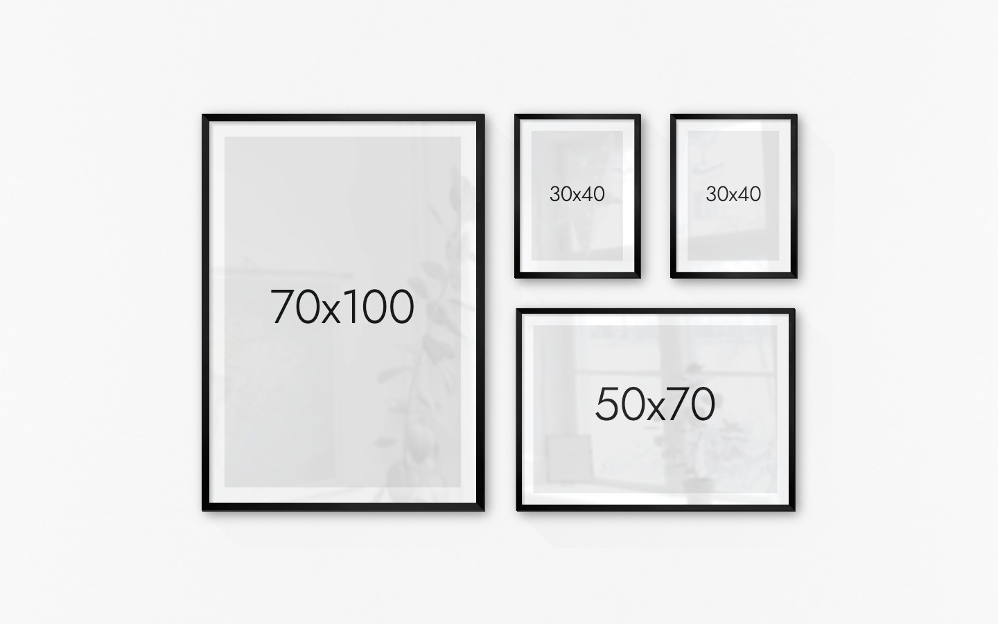 Tavelvägg med ramar i svart i storlekar 70x100, 30x40 och 50x70